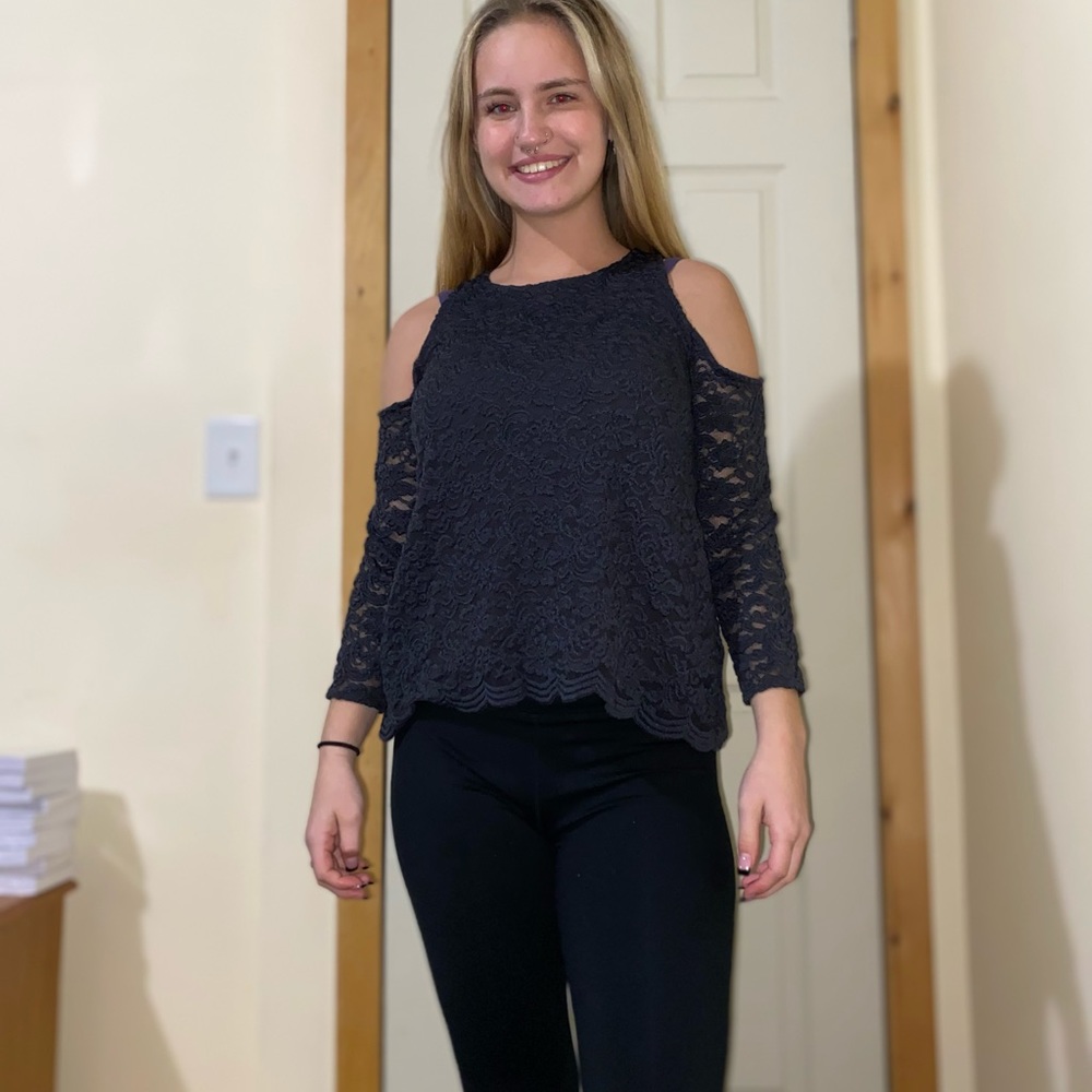 Shirt with cut out on shoulder